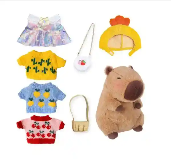 Peluche Capibara Con 9 Piezas De Ropa