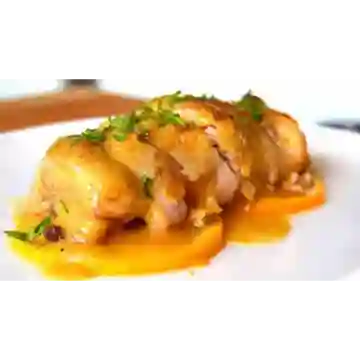 Pollo en salsa de cítricos