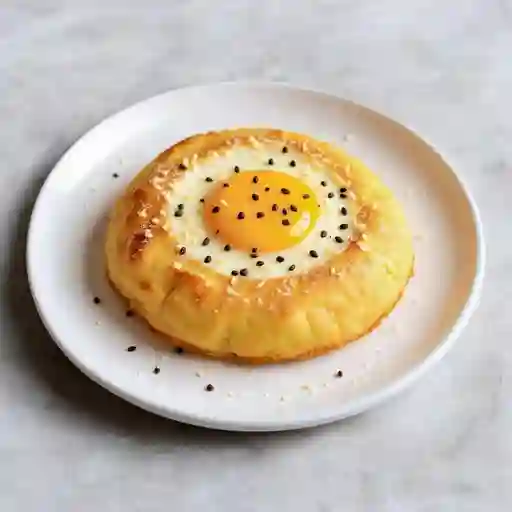 Arepa con Huevo en Masa Dulce