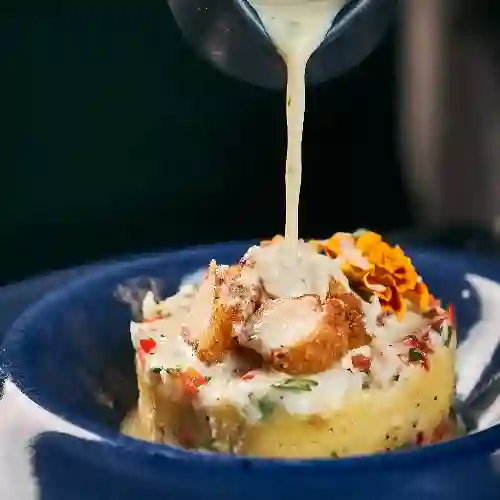 Causa de Robalo con Chicharron de Pulpo