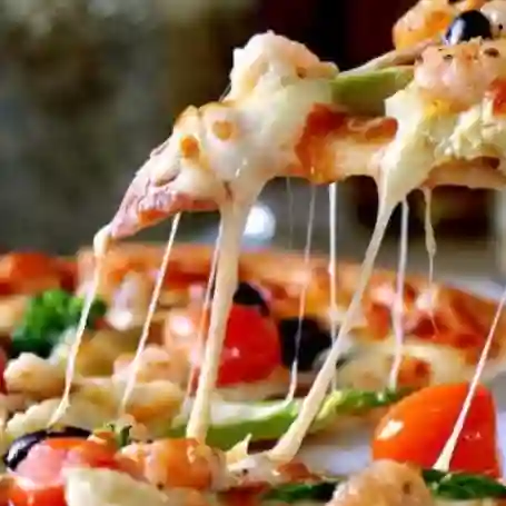 4 Porciones (Arma tu Pizza) + Gaseosa Gratis 400 Ml