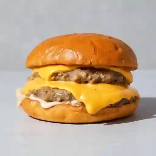 Cheese Burger con Papas y Coke