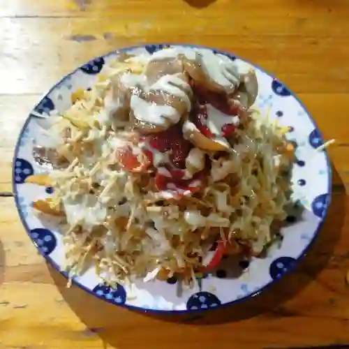 Salchipapa de la Casa
