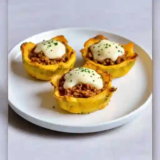 Patacones gratinados con carne