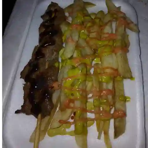 Chuzo de res con papas