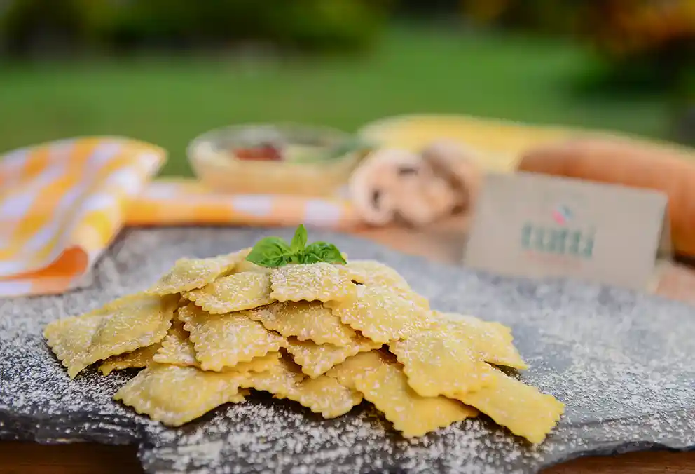 Raviolis De Maduro Queso Y tocineta