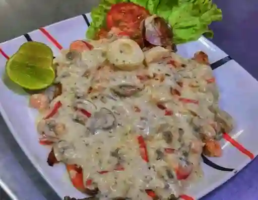 Trucha en Salsa de Mariscos