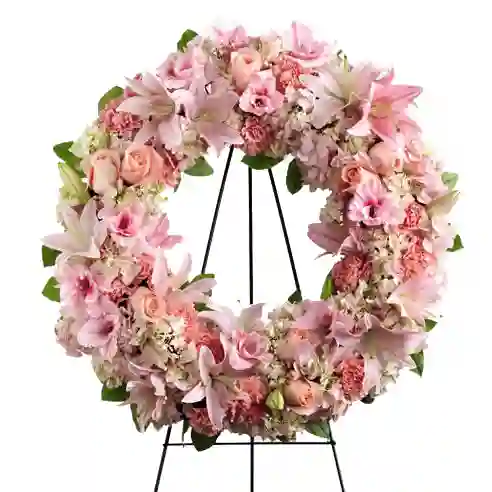corona Fúnebre de condolencias en hortensias . lirios. rosas