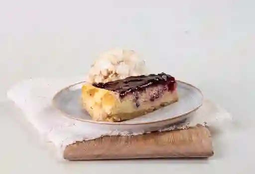 Porción Cheesecake con Helado