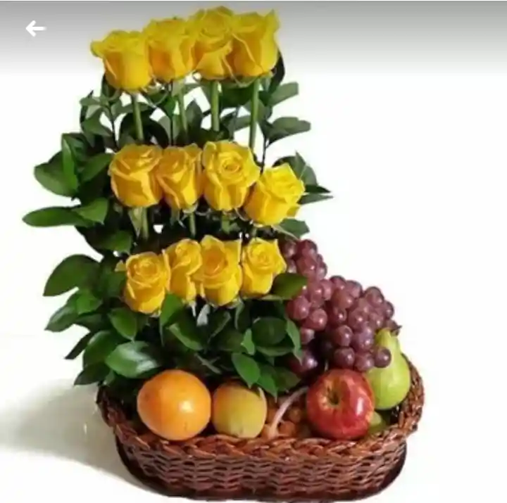 Frutero alana . canasta con variedad de frutas