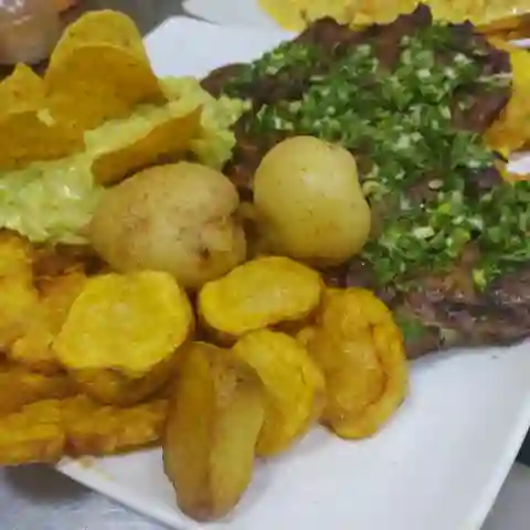 Patacón Hígado Encebollado