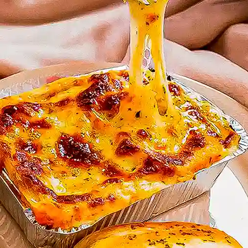 Lasagna de Pollo y Bebida