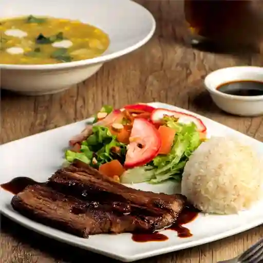 Sobrebarriga Dorada en Salsa Sillao