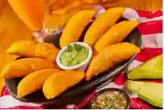 2 Empanadas Vallunas Machetazo + Naranjada