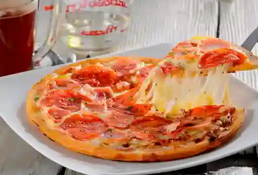 Porción de Pizza Carnes