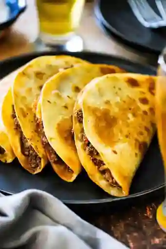 1 Quesadilla y 2 Tacos