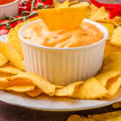 Porción de Nachos con Queso Cheddar