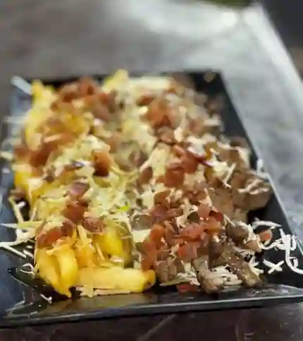 Chuzo de Carne con Papas a la Francesa