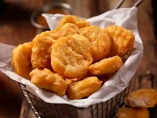 Porción Nuggets