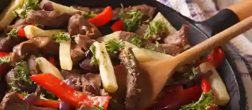 Saltado Mixto (Res y Cerdo)