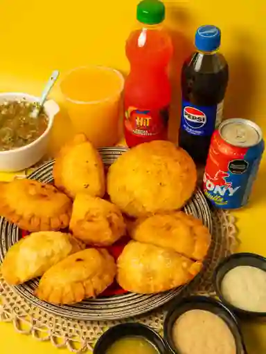 1 Arepa De Huevo Y 1 Empanada