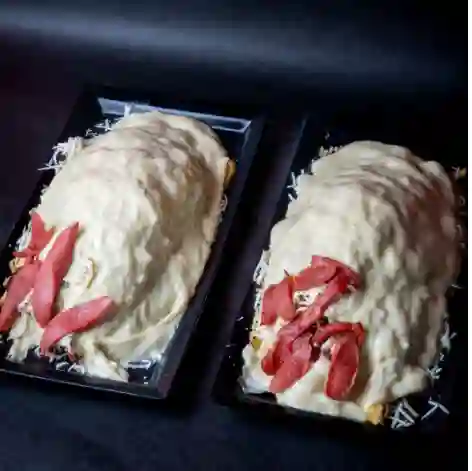 2 Salchipapas Gratinadas