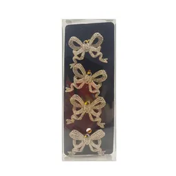 Pack Colgante Clips Moños Palacio Navidad 2024