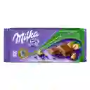 Milka Chocolate con Leche Broken Hazelnut 