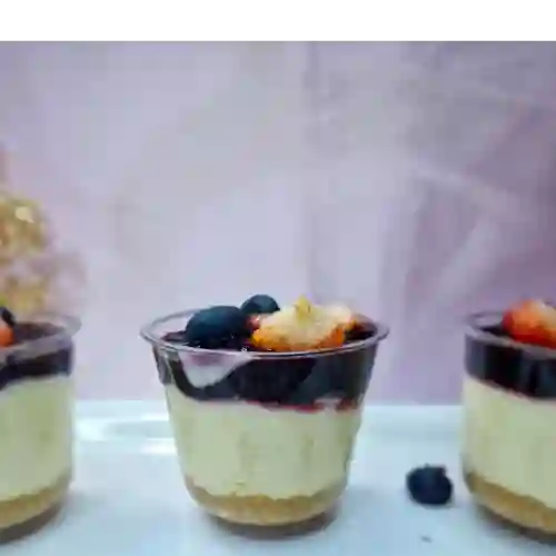 Porción Cheesecake Frutos Rojos