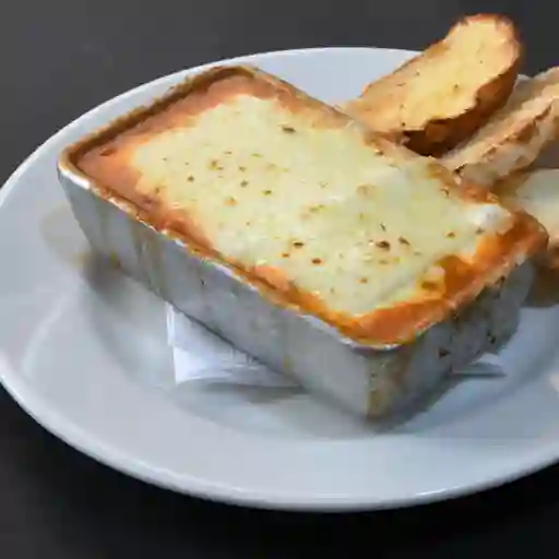 Lasaña con pollo jamón y champiñones