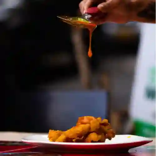 Pollo y Cerdo a la Naranja