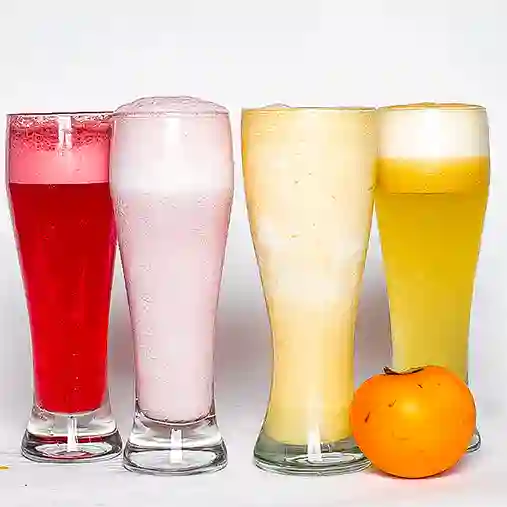 Jugos Naturales en Leche 18 Oz