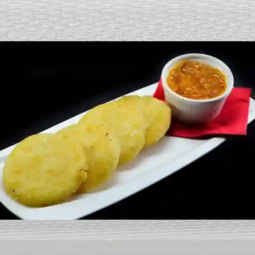 Entrada arepitas fritas con hogao