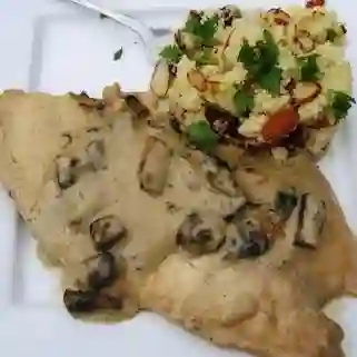 Robalo en Champiñones