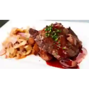 Chuleta en salsa ciruela