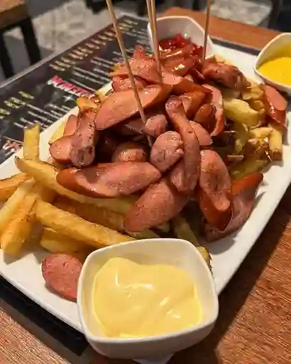Salchipapas chicken and chips