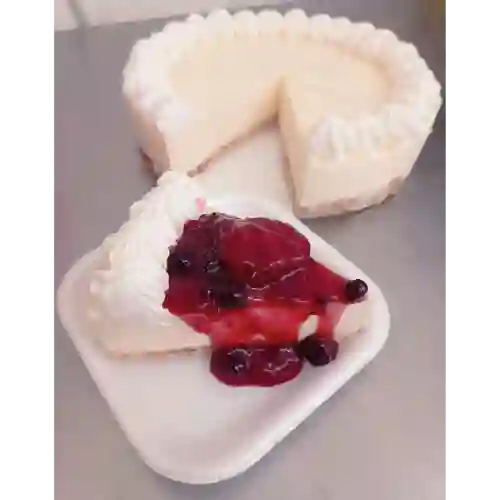 Porción Cheseecake Frutos Rojos
