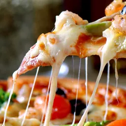 Porción de Pizza Personal Vegetariana