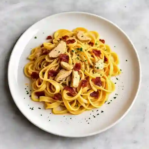 Pasta Carbonara con Aceite de Trufa