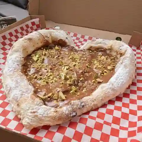 Pizza dolce nutella e pistacchio