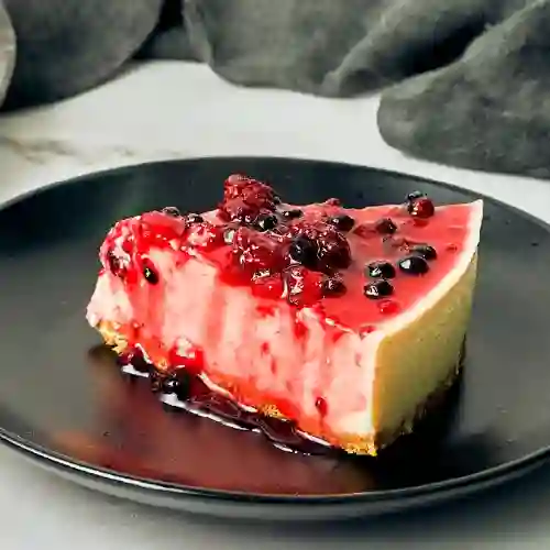 Porción Cheesecake Frutos Rojos