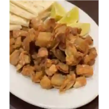 Tocino y Arepa de Mote