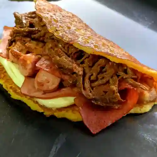 la 52 de Carne, Pollo y 6 Toppings