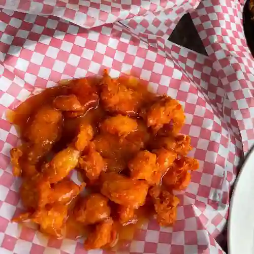 Porcion de Pollo a la Naranja