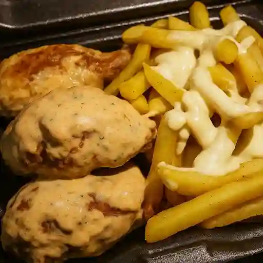 Muslos de pollo en salsa blanca