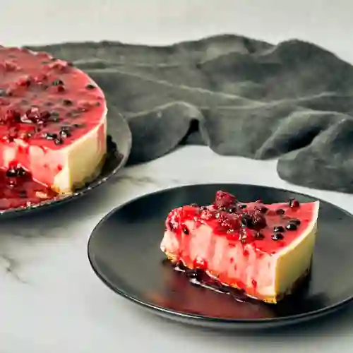 Porción Cheesecake de Frutos Rojos