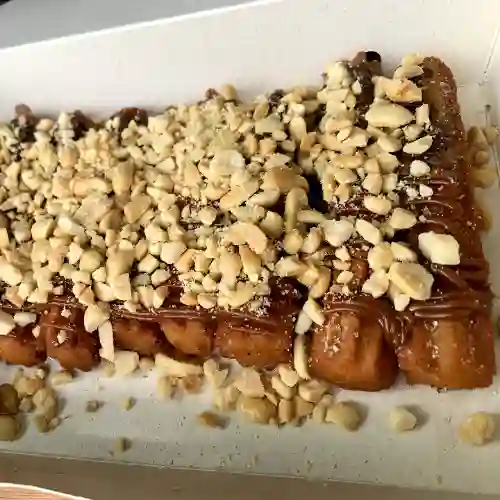 15 Und Churros con Toppings