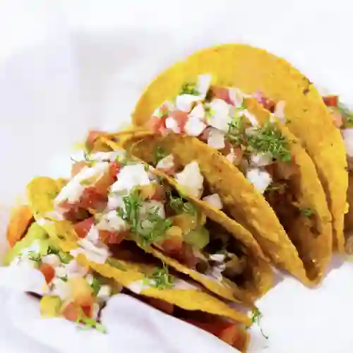 Tacos Shell de Res Desmechada