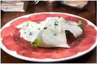 Carpaccio Di Manzo con Rucola E Parmigiano