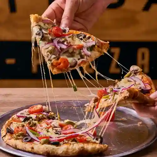 Pizza artesana personal (21 cm)